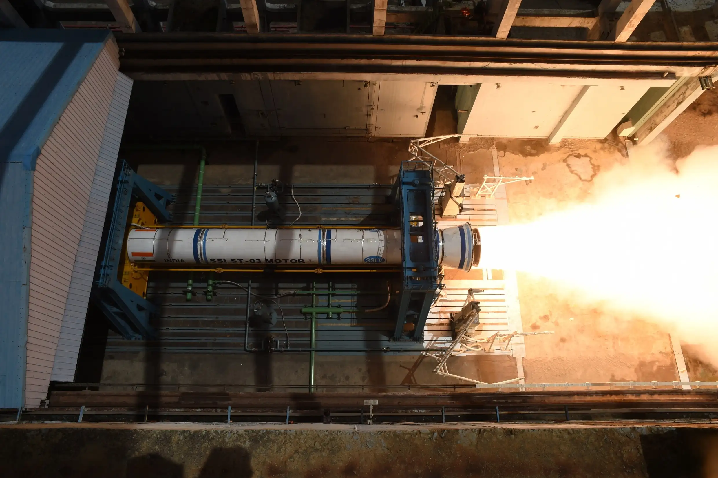 The improved SSLV SS1 solid motor firing horizontally on a test stand at Sriharikota