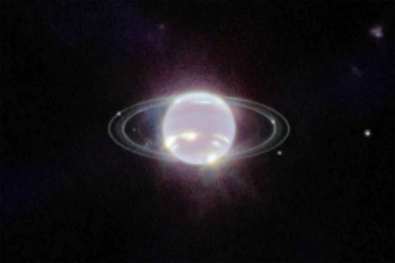 Near-infrared Webb image of Neptune's rings and six small moons against a dark field